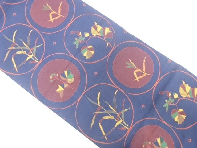 丸紋に草葉模様織出し袋帯